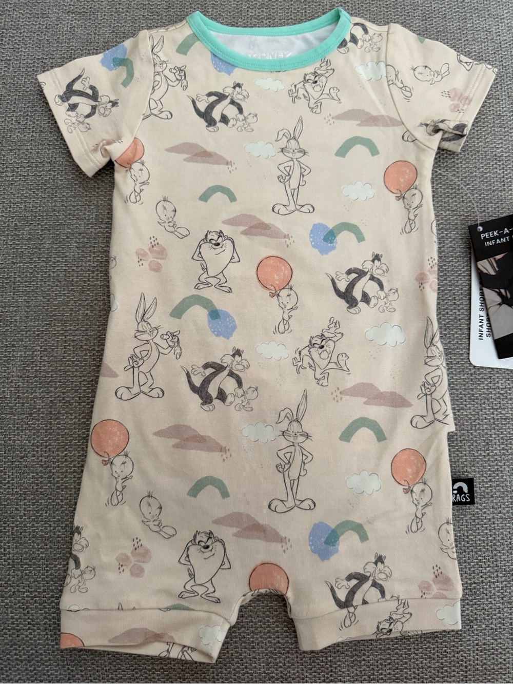 Rags Looney Tunes Short Sleeve One-Piece Romper in Cream with Cartoon Print
